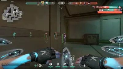 Example of a small static Valorant crosshair against a practice range background.